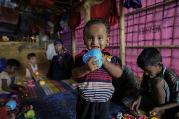 Rohingya children play with the toys donated by VSO