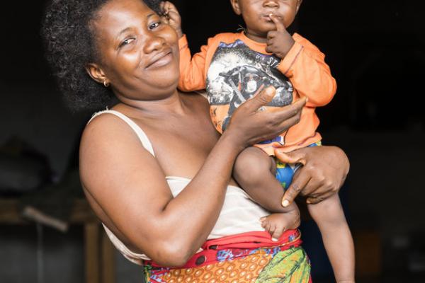 Sento Timbo holds her one-year-old, Shaku, whom she very nearly lost in terrible flooding following a catastrophic mudslide in Freetown, Sierra Leone. Sento Timbo holds her one-year-old, Shaku, whom she very nearly lost in terrible flooding following a catastrophic mudslide in Freetown, Sierra Leone.