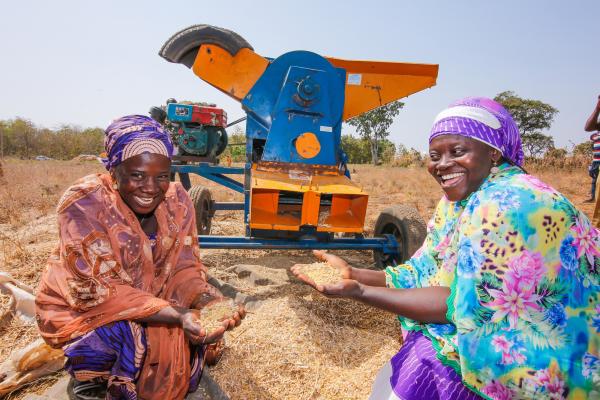 Fatima Zubairu and Fatima Al Hassan are pictured here with a thresher machine that strips the husks and stalks from soya beans. Fatima Zubairu and Fatima Al Hassan are pictured here with a thresher machine that strips the husks and stalks from soya beans.