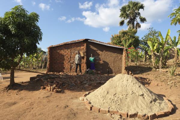 Mr. Arone Armando, 56, and his wife Margarida, 45, in front of their destroyed home after Cyclone Idai. Mudjacure locality, Macate district, Mozambique