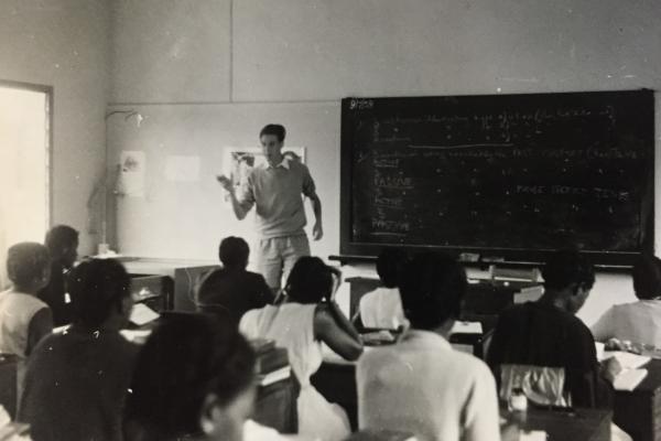 Volunteer Chris Tipple teaching English in a class