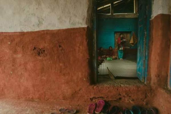 A Nepalese house looking inside through the door